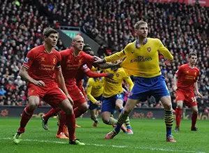 Liverpool V Arsenal 2013-14 Prints: Per Mertesacker vs. Steven Gerrard and Martin Skrtel: Intense Battle at Anfield (Liverpool v Arsenal)
