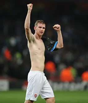 Arsenal V Napoli 2013-14 Prints: Per Mertesacker's Celebration: Arsenal Triumphs Over Napoli in Champions League (2013)