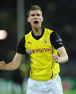 Borussia Dortmund V Arsenal 2013-14 Prints: Per Mertesacker's Champion Moment: Arsenal's Historic Win at Borussia Dortmund