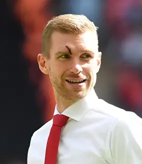 Per Mertesacker's Defiant Stand: Arsenal's FA Community Shield Battle against Chelsea (2017-18)