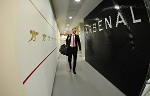 Arsenal V Liverpool 2014-15 Prints: Per Mertesacker's Focus: Arsenal Changing Room Before Arsenal vs. Liverpool (2014-15)