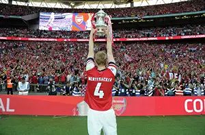 Per Mertesacker's Glory: Arsenal's FA Cup Victory at Wembley Stadium