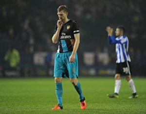 Sheffield Wednesday V Arsenal - Capital One Cup 2015-16 Prints: Per Mertesacker's Reaction: Arsenal Overcome Sheffield Wednesday in Capital One Cup