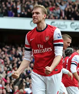 Per Mertesacker's Stunner: Arsenal's Thrilling 5-2 Victory Over Tottenham in the Premier League