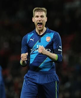 Images Dated 13th February 2009: Per Mertesacker's Triumph: Arsenal Celebrates FA Cup Quarterfinal Victory over Manchester United