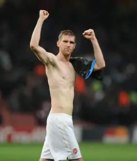 Arsenal V Napoli 2013-14 Prints: Per Mertesacker's Triumph: Arsenal's Champions League Victory Over Napoli (2013)