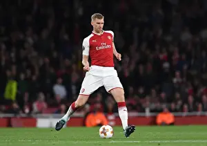Arsenal V FC Köln 2017-18 Prints: Per Mertesacker's Unwavering Focus: Arsenal's Defensive Wall Against 1