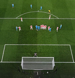 Arsenal v Barcelona 2015/16 Collection: Messi Faces Arsenal's Wall: A Champions League Showdown