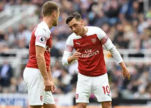 Newcastle United V Arsenal 2018-19 Prints: Mesut Ozil and Aaron Ramsey in Deep Conversation: Newcastle United vs
