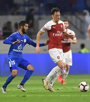 Al-Nasr Dubai SC V Arsenal 2018-19 Prints: Mesut Ozil: In Action for Arsenal against Al-Nasr Dubai SC (2018-19)