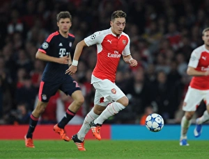 Arsenal V Bayern Munich 2015/16 Prints: Mesut Ozil in Action: Arsenal FC vs. FC Bayern Munchen - UEFA Champions League 2015/16