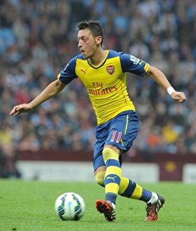 Aston Villa V Arsenal 2014-15 Prints: Mesut Ozil in Action: Arsenal vs. Aston Villa, Premier League 2014-15
