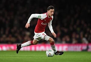 Images Dated 24th January 2018: Mesut Ozil in Action: Arsenal vs. Chelsea - Carabao Cup Semi-Final