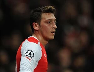 Images Dated 25th February 2015: Mesut Ozil in Action: Arsenal vs AS Monaco, UEFA Champions League 2015