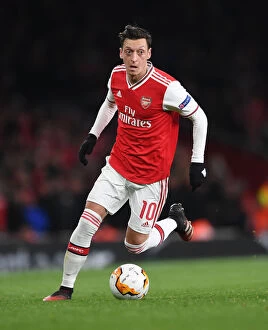 Images Dated 28th February 2020: Mesut Ozil in Action: Arsenal vs. Olympiacos, Europa League 2020