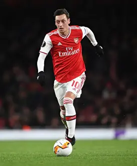 Mesut Ozil in Action: Arsenal vs. Olympiacos - Europa League Clash at Emirates Stadium