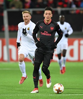 Ostersunds V Arsenal 2017-18 Prints: Mesut Ozil in Action: Arsenal vs Ostersunds FK, UEFA Europa League 2018