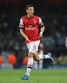 Arsenal V Napoli 2013-14 Prints: Mesut Ozil in Action: Arsenal vs. SSC Napoli, UEFA Champions League, 2013