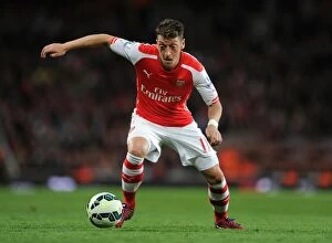 Images Dated 11th May 2015: Mesut Ozil in Action: Arsenal vs Swansea City, Premier League 2014/15