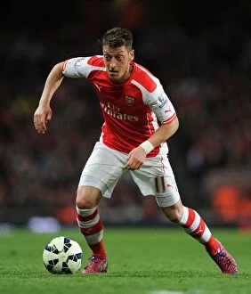 Images Dated 11th May 2015: Mesut Ozil in Action: Arsenal vs Swansea City, Premier League 2014/15