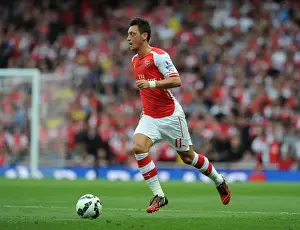 Arsenal V Tottenham Hotspur 2014-15 Prints: Mesut Ozil in Action: Arsenal vs. Tottenham Premier League Clash (2014-15)