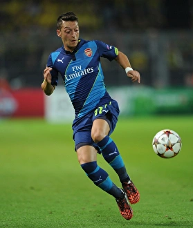 Borussia Dortmund V Arsenal 2014-15 Prints: Mesut Ozil in Action: Borussia Dortmund vs. Arsenal, UEFA Champions League (2014-15)