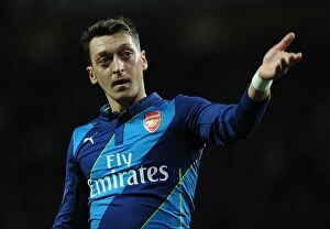 Images Dated 13th February 2009: Mesut Ozil in Action: Manchester United vs. Arsenal - FA Cup Quarterfinal, 2015