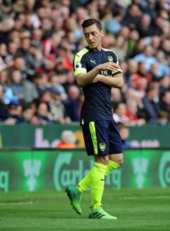 Images Dated 13th May 2017: Mesut Ozil in Action: Stoke City vs. Arsenal, Premier League 2016-17