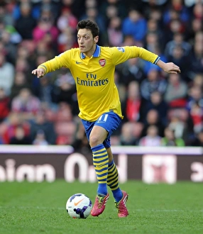 Stoke City V Arsenal 2013-14 Prints: Mesut Ozil in Action: Stoke City vs. Arsenal, Premier League 2013-14
