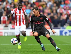 Stoke City V Arsenal 2017-18 Prints: Mesut Ozil in Action: Stoke City vs Arsenal, Premier League 2017-18