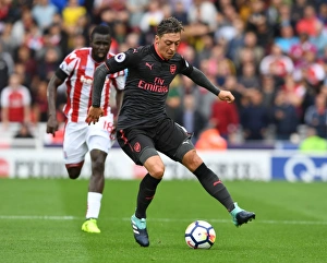 Stoke City V Arsenal 2017-18 Prints: Mesut Ozil in Action: Stoke City vs Arsenal, Premier League 2017-18