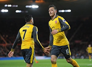 Mesut Ozil and Alexis Sanchez: A High-Fiving Moment at Middlesbrough's Riverside Stadium (Arsenal vs Middlesbrough, 2016-17)