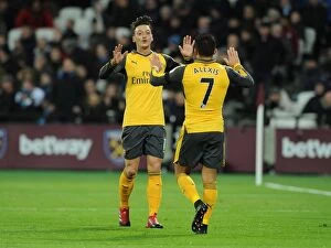 West Ham United v Arsenal 2016-17 Collection: Mesut Ozil and Alexis Sanchez Celebrate Goal: West Ham United vs Arsenal, 2016-17 Premier League