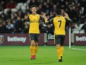West Ham United v Arsenal 2016-17 Collection: Mesut Ozil and Alexis Sanchez Celebrate Goal for Arsenal against West Ham United, 2016-17 Season
