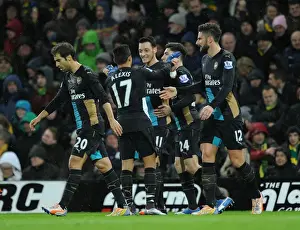 Norwich City V Arsenal 2015-16 Prints: Mesut Ozil and Alexis Sanchez: A Dazzling Duo in Full Glory - Arsenal's Goal Celebration vs Norwich City