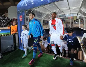 Monaco V Arsenal 2014/15 Prints: Mesut Ozil and Anthony Martial: Clash of Stars in Monaco's Champion's League Showdown Against Arsenal