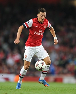 Arsenal V Napoli 2013-14 Prints: Mesut Ozil (Arsenal). Arsenal 2: 0 Napoli