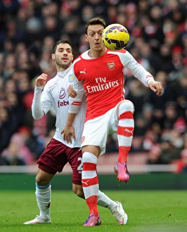 Mesut Ozil (Arsenal) Carles Gil (Villa). Arsenal 5:0 Aston Villa. Barclays Premier League Mesut Ozil (Arsenal) Carles Gil (Villa). Arsenal 5:0 Aston Villa. Barclays Premier League
