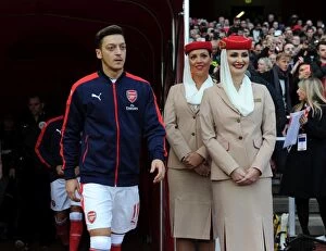 Images Dated 22nd October 2016: Mesut Ozil (Arsenal) Emirates hostesess. Arsenal 0: 0 Middlesbrough. Premier League