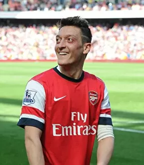 Images Dated 4th May 2014: Mesut Ozil - Arsenal Football Club: Arsenal vs West Bromwich Albion, Premier League 2013-14