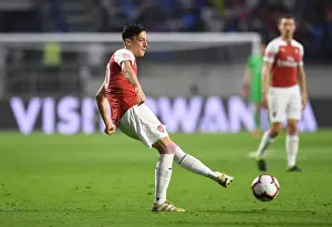 Mesut Ozil of Arsenal during the match between Al-Nasr Duabi SC and Arsenal at Al Maktoum Stadium on March 26