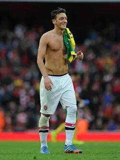 Arsenal v Norwich City 2013-14 Collection: Mesut Ozil (Arsenal) after the match. Arsenal 4: 1 Norwich City. Barclays Premier League