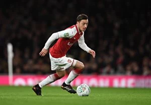 Images Dated 24th January 2018: Mesut Ozil: Arsenal Star in Action against Chelsea
