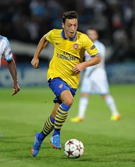 Mesut Ozil: Arsenal Star in Action against Olympique Marseille (2013-14)