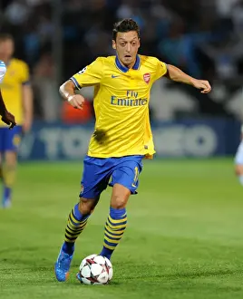Marseille V Arsenal 2013-14 Prints: Mesut Ozil: Arsenal Star in Action against Olympique Marseille (2013-14 UEFA Champions League)