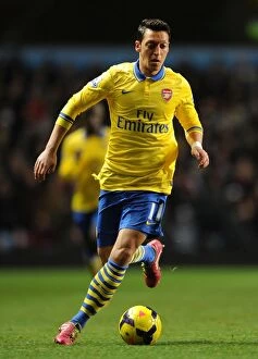 Images Dated 13th January 2014: Mesut Ozil: Arsenal vs. Aston Villa, Premier League 2013-14 - In Action