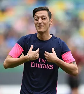 Sporting Lisbon V Arsenal 2018-19 Prints: Mesut Ozil: Arsenal's Star Guns for Europa League Victory against Sporting Lisbon