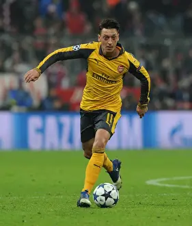Bayern Munich V Arsenal 2016-17 Prints: Mesut Ozil: Arsenal's Star Performance against Bayern Munich in UEFA Champions League (Munich 2017)