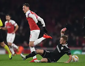 Arsenal V Qarabag 2018-19 Prints: Mesut Ozil Backheels Past Maksin Medvedev: Arsenal vs Qarabag, UEFA Europa League 2018-19