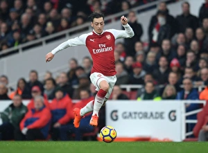 Arsenal V Tottenham Hotspur 2017-18 Prints: Mesut Ozil: Battle of the Capital - Arsenal vs. Tottenham, Premier League 2017-18